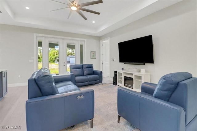 2312 4th Ave SE, Naples, FL 34117 - living area featuring ceiling fan, a tray ceiling, recessed lighting, french doors, and baseboards