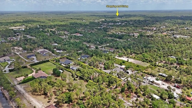 2312 4th Ave SE, Naples, FL 34117 - aerial view featuring a wooded view