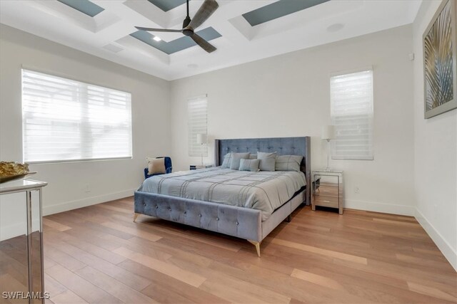 3721 Sapphire Cove Cir, Naples, FL 34114 - bedroom featuring coffered ceiling, light wood-style floors, baseboards, beamed ceiling, and a ceiling fan