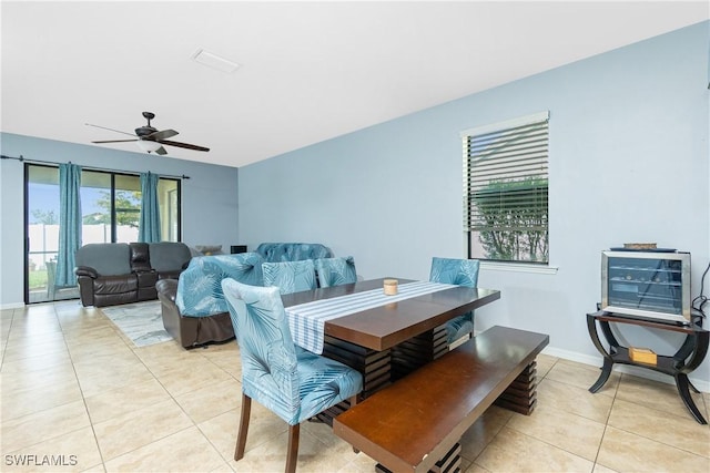 2628 Sherman Oak Dr, North Port, FL 34289 - dining space featuring light tile patterned flooring, baseboards, and ceiling fan