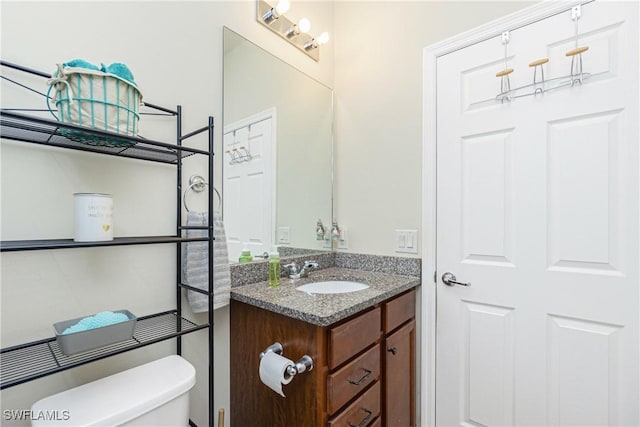2628 Sherman Oak Dr, North Port, FL 34289 - bathroom featuring toilet and vanity
