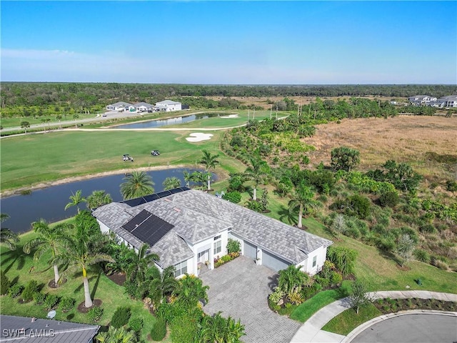 bird's eye view featuring a water view and golf course view