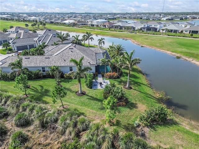 birds eye view of property featuring a residential view and a water view
