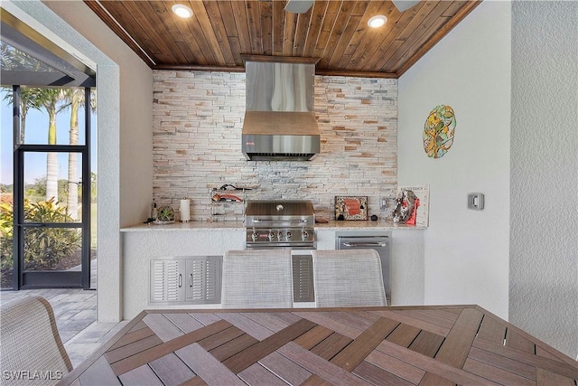 kitchen featuring ornamental molding, wall chimney range hood, recessed lighting, light countertops, and wood ceiling
