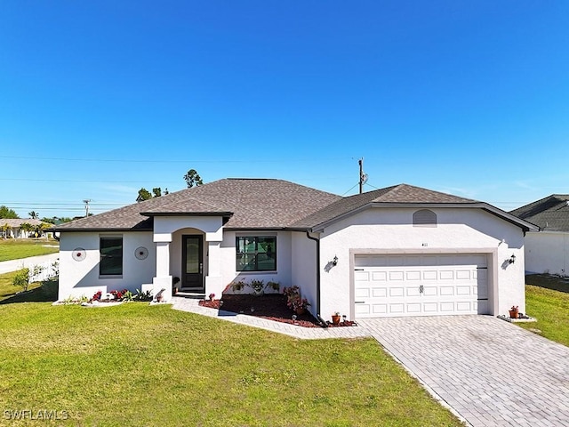 411 SW 19th Ter, Cape Coral, FL 33991 - ranch-style house featuring a garage, stucco siding, driveway, and a front lawn
