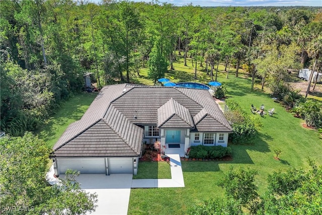 1420 14th Ave NE, Naples, FL 34120 - aerial view of property and surrounding area featuring a forest