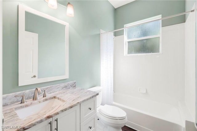 1420 14th Ave NE, Naples, FL 34120 - bathroom with vanity, toilet, and shower / tub combo