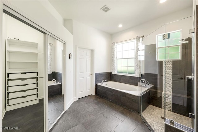 1420 14th Ave NE, Naples, FL 34120 - full bathroom featuring a garden tub, a stall shower, recessed lighting, and baseboards