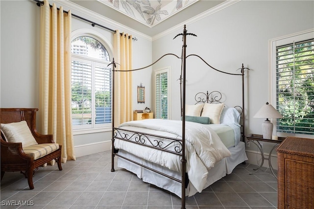 23771 Tuscany Way, Bonita Springs, FL 34134 - tiled bedroom featuring baseboards and ornamental molding