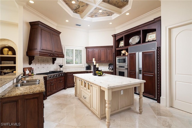 23771 Tuscany Way, Bonita Springs, FL 34134 - kitchen featuring coffered ceiling, open shelves, custom range hood, a sink, and built in appliances