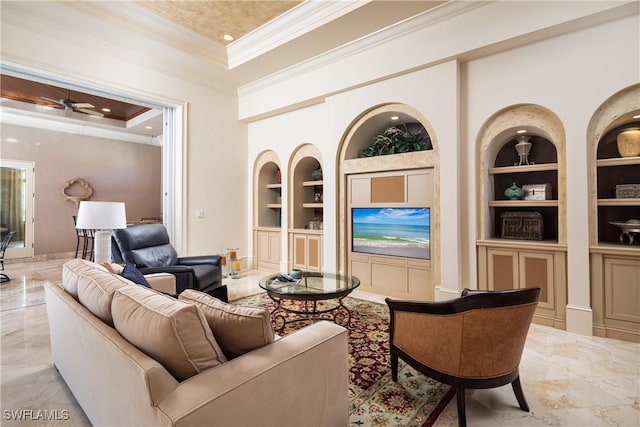 23771 Tuscany Way, Bonita Springs, FL 34134 - living room with marble finish floor, ceiling fan, built in shelves, ornamental molding, and a tray ceiling