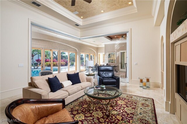 23771 Tuscany Way, Bonita Springs, FL 34134 - living area featuring visible vents, crown molding, marble finish floor, ceiling fan, and a raised ceiling