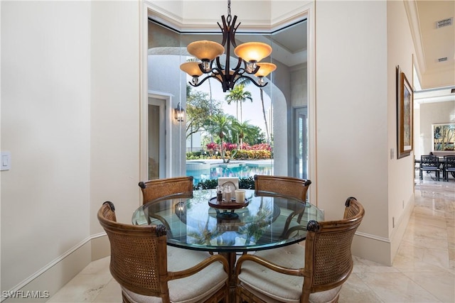 23771 Tuscany Way, Bonita Springs, FL 34134 - dining room with baseboards, ornamental molding, visible vents, and a notable chandelier