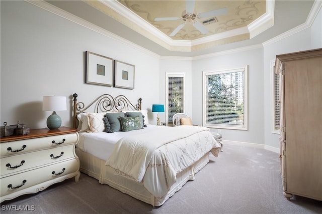 23771 Tuscany Way, Bonita Springs, FL 34134 - bedroom featuring carpet flooring, visible vents, baseboards, ornamental molding, and a raised ceiling