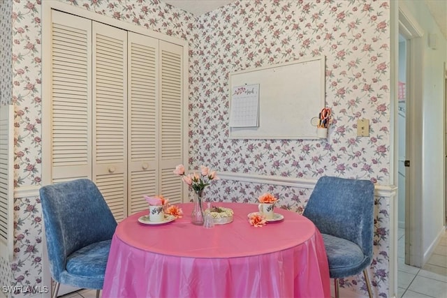 2220 SE 2nd Ter, Cape Coral, FL 33990 - tiled dining space with wallpapered walls and baseboards