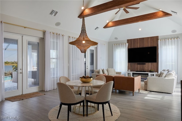42207 Lake Timber Dr, Punta Gorda, FL 33982 - dining room featuring french doors, light wood-style floors, beamed ceiling, and visible vents