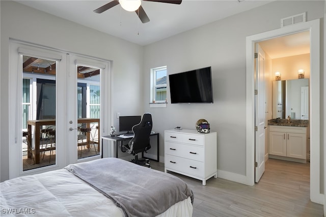 42207 Lake Timber Dr, Punta Gorda, FL 33982 - bedroom featuring baseboards, visible vents, french doors, access to outside, and light wood-type flooring