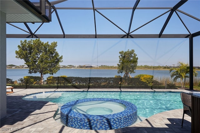 42207 Lake Timber Dr, Punta Gorda, FL 33982 - view of pool featuring a water view, a lanai, and a pool with connected hot tub