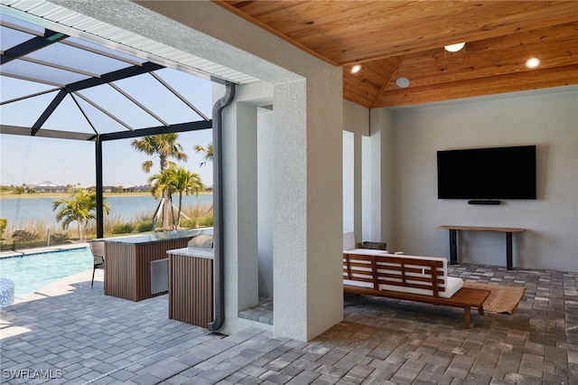 42207 Lake Timber Dr, Punta Gorda, FL 33982 - view of patio / terrace with a water view, area for grilling, glass enclosure, outdoor lounge area, and an outdoor pool