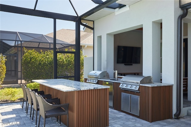 42207 Lake Timber Dr, Punta Gorda, FL 33982 - sunroom / solarium with outdoor wet bar and exterior kitchen