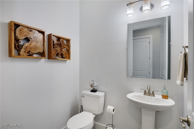 42207 Lake Timber Dr, Punta Gorda, FL 33982 - bathroom featuring a sink and toilet