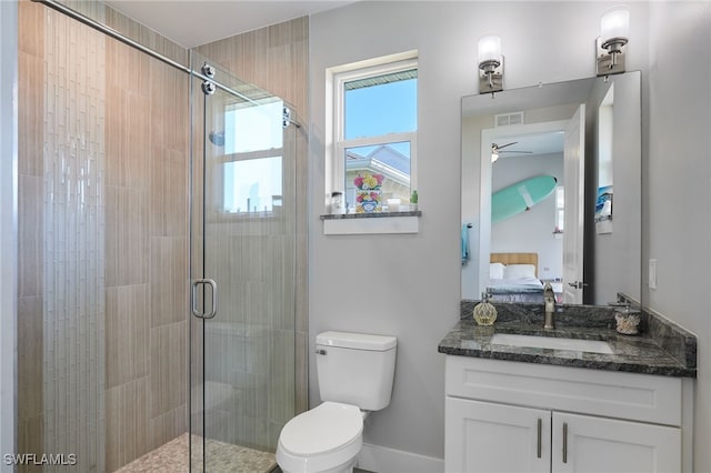 42207 Lake Timber Dr, Punta Gorda, FL 33982 - bathroom with a ceiling fan, visible vents, ensuite bath, a stall shower, and toilet