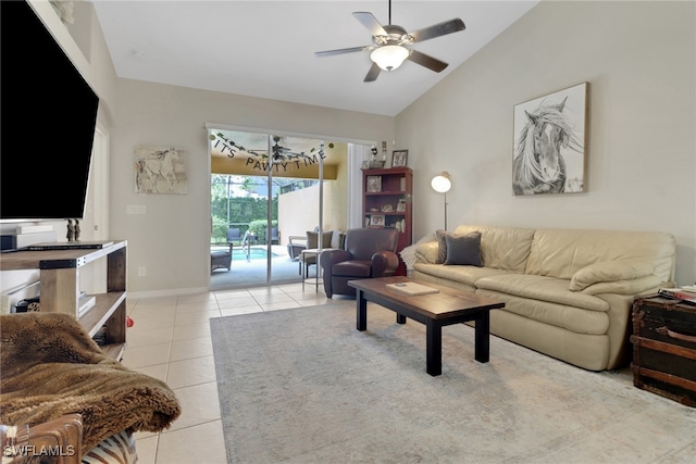 15501 Cortona Way, Naples, FL 34120 - living room featuring lofted ceiling, light tile patterned floors, a ceiling fan, and baseboards