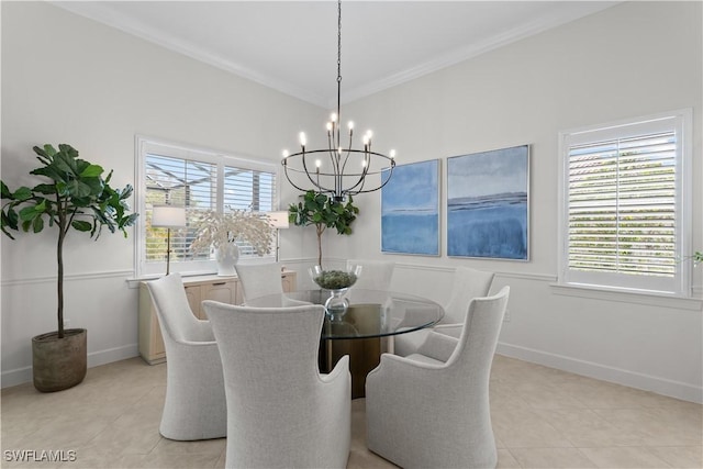 dining room with baseboards, an inviting chandelier, ornamental molding, and light tile patterned flooring