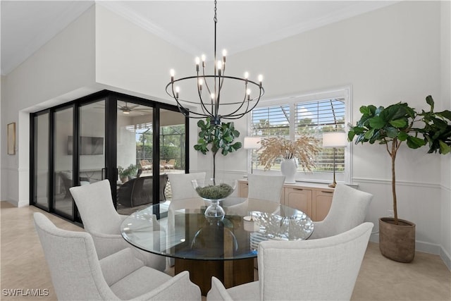 dining space with a notable chandelier and ornamental molding