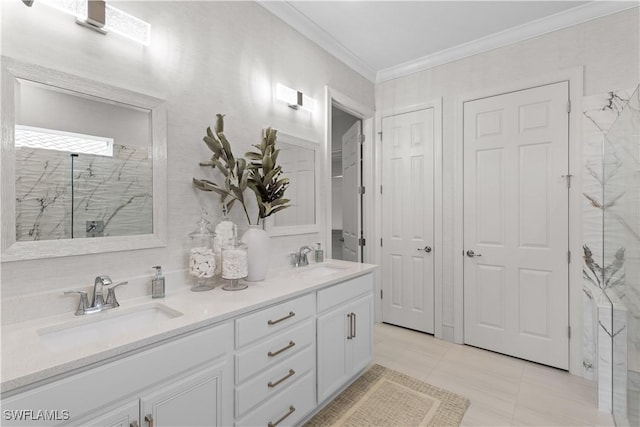 bathroom featuring double vanity, a marble finish shower, a sink, and ornamental molding