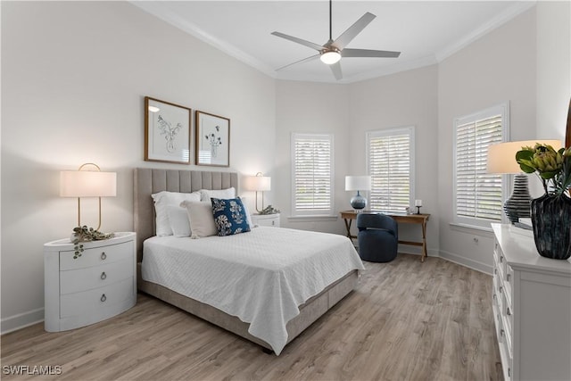 bedroom featuring light wood-style flooring, baseboards, crown molding, and a ceiling fan