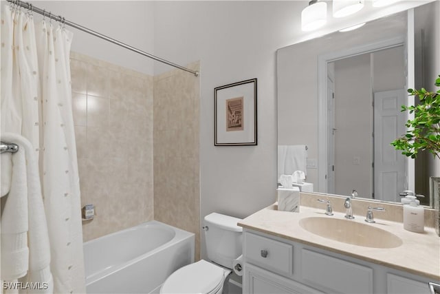 bathroom featuring vanity, shower / bath combination with curtain, and toilet