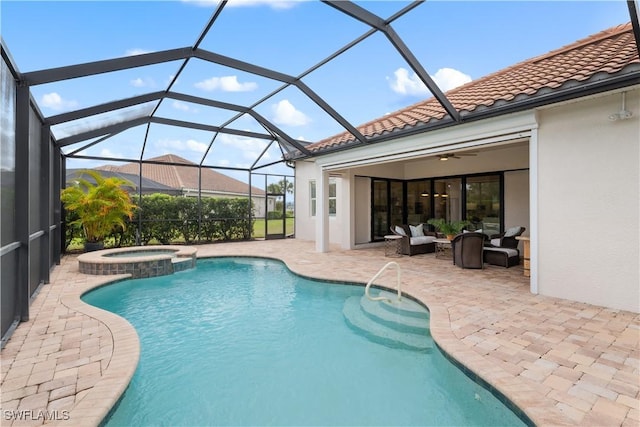 view of swimming pool featuring a patio area and a pool with connected hot tub