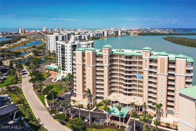 4141 Bay Beach Ln Unit 475, Fort Myers Beach, FL 33931 - view of building exterior featuring a water view and a view of city