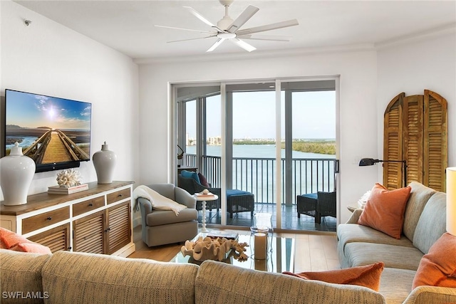 4141 Bay Beach Ln Unit 475, Fort Myers Beach, FL 33931 - living room with a water view, wood finished floors, and ceiling fan