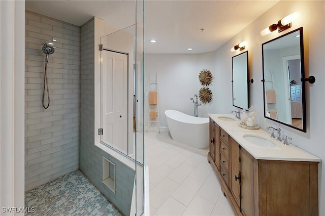 4141 Bay Beach Ln Unit 475, Fort Myers Beach, FL 33931 - full bath with a sink, a soaking tub, tile patterned floors, and a tile shower