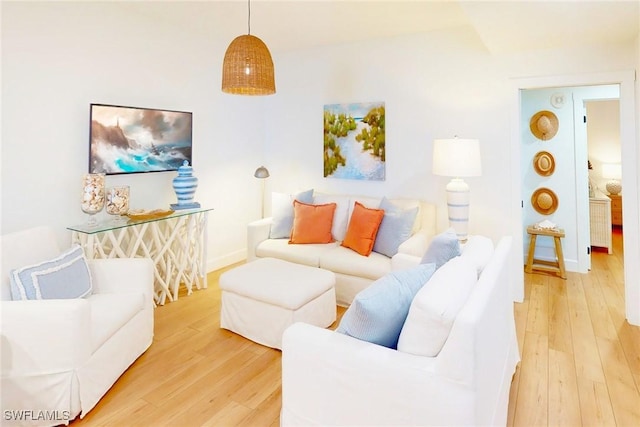 4141 Bay Beach Ln Unit 475, Fort Myers Beach, FL 33931 - living room featuring light wood-style floors and baseboards