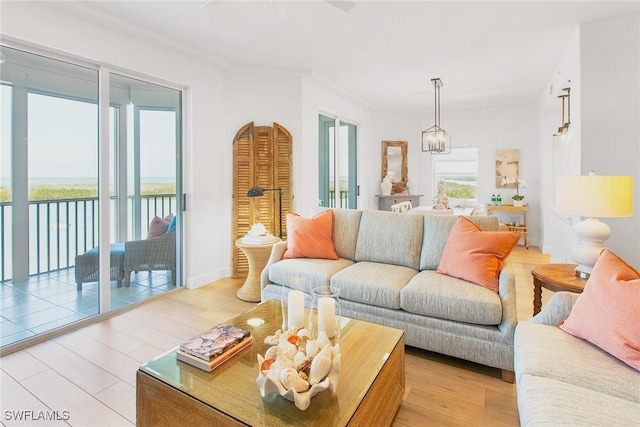 4141 Bay Beach Ln Unit 475, Fort Myers Beach, FL 33931 - living room featuring light wood-style flooring