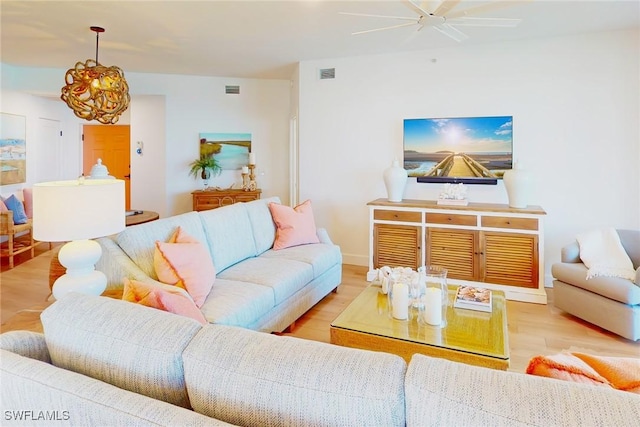 4141 Bay Beach Ln Unit 475, Fort Myers Beach, FL 33931 - living area with ceiling fan, visible vents, and wood finished floors