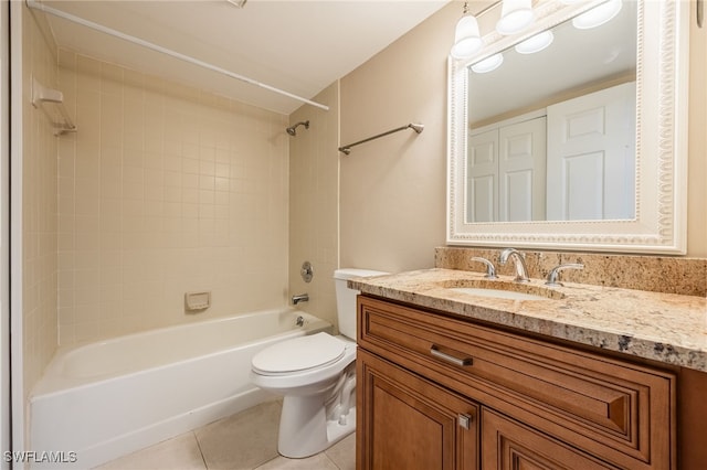 912 SW 48th Ter Unit 108, Cape Coral, FL 33914 - full bath featuring toilet, tile patterned flooring, vanity, and washtub / shower combination