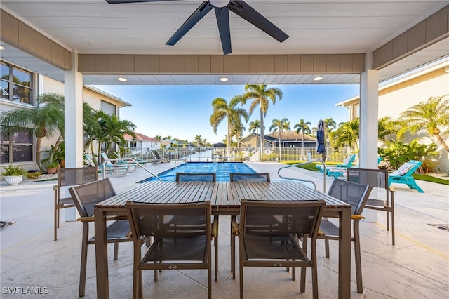 912 SW 48th Ter Unit 108, Cape Coral, FL 33914 - view of patio with ceiling fan, a residential view, and outdoor dining area