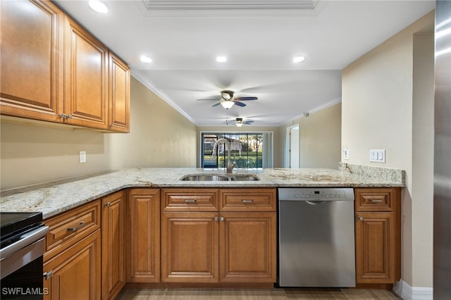 912 SW 48th Ter Unit 108, Cape Coral, FL 33914 - kitchen with appliances with stainless steel finishes, a sink, brown cabinets, a ceiling fan, and crown molding