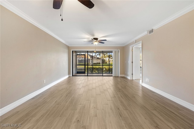 912 SW 48th Ter Unit 108, Cape Coral, FL 33914 - spare room with a ceiling fan, baseboards, ornamental molding, and wood finished floors
