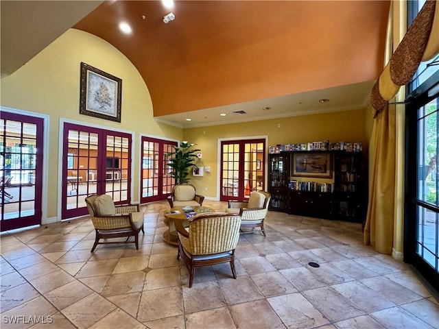 8550 Kingbird Loop Unit 638, Estero, FL 33967 - living area featuring french doors, high vaulted ceiling, crown molding, and recessed lighting