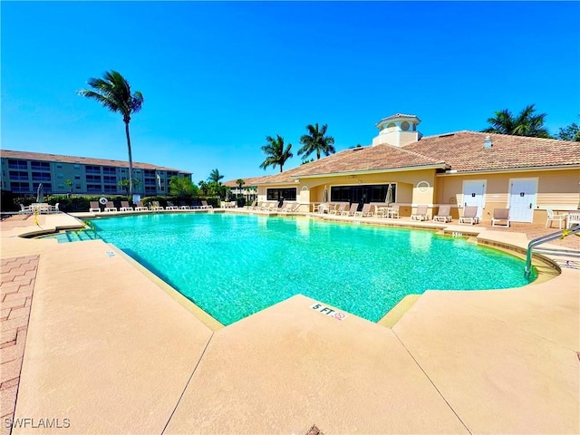 8550 Kingbird Loop Unit 638, Estero, FL 33967 - community pool featuring a patio area