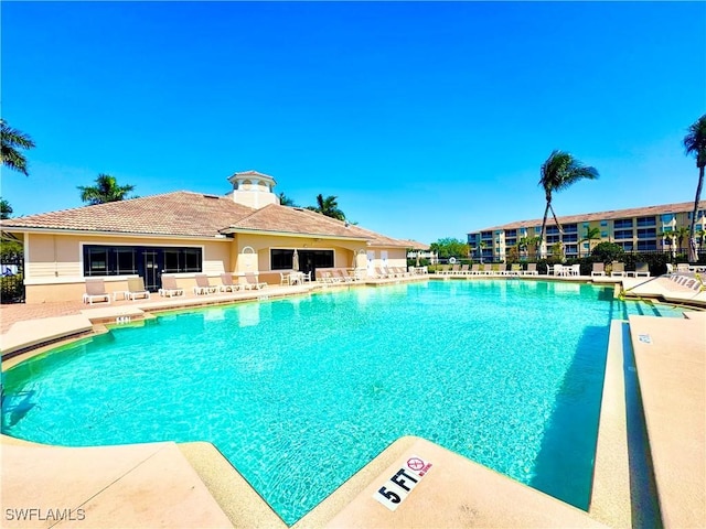 8550 Kingbird Loop Unit 638, Estero, FL 33967 - community pool featuring a patio area