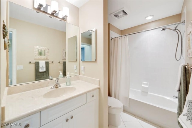 10530 Amiata Way Unit 105, Fort Myers, FL 33913 - full bathroom featuring tile patterned flooring, vanity, toilet, visible vents, and shower / bath combination with curtain