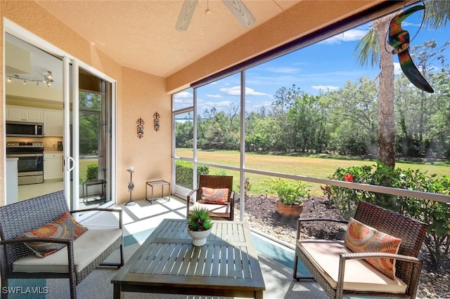 10530 Amiata Way Unit 105, Fort Myers, FL 33913 - sunroom / solarium featuring a ceiling fan