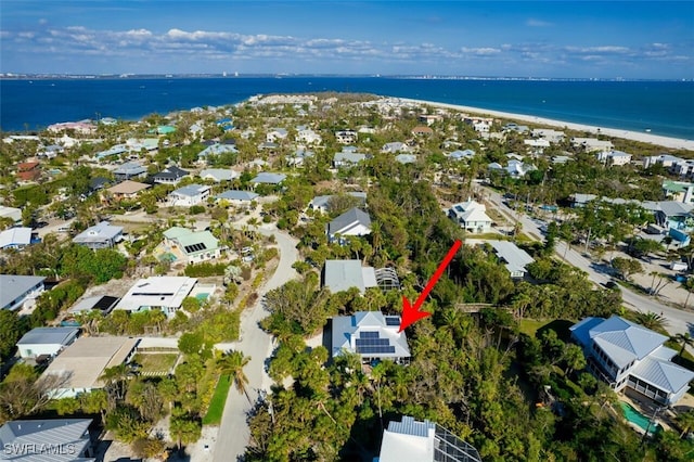 birds eye view of property featuring a residential view and a water view