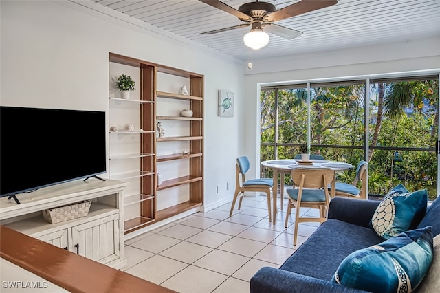 living room featuring light tile patterned flooring and a ceiling fan